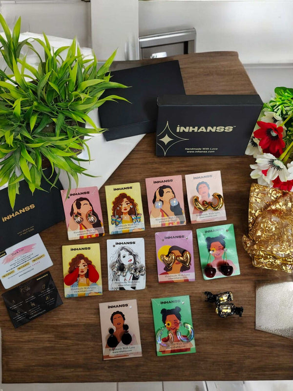 Sparkling Serenade: 10-Piece Statement Earrings Rakhi Hamper