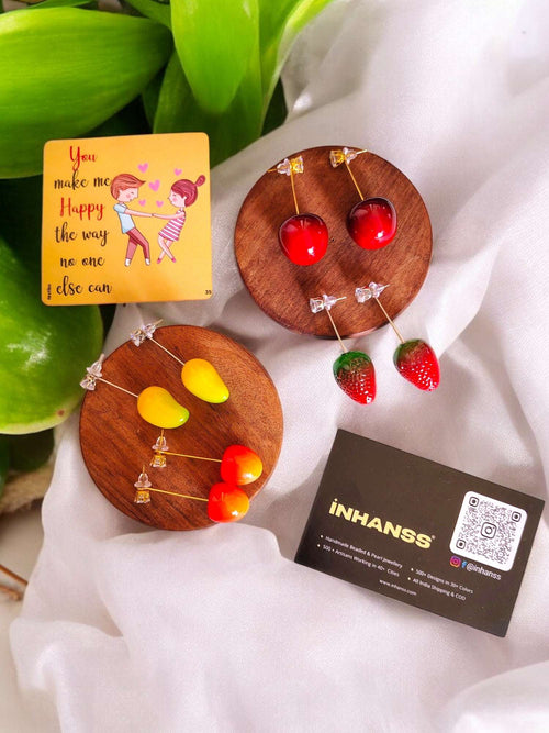 Fruitful Delights Rakhi Hamper – Orange • Mango • Cherry • Strawberry