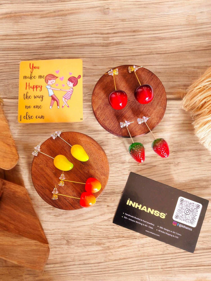 Fruitful Delights Rakhi Hamper – Orange • Mango • Cherry • Strawberry