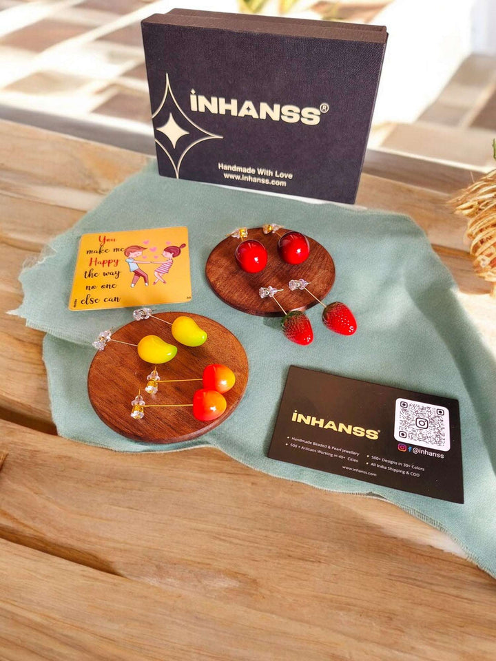 Fruitful Delights Rakhi Hamper – Orange • Mango • Cherry • Strawberry